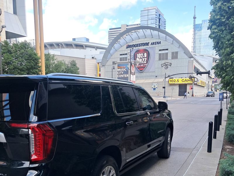 Black SUV near Bridgestone Arena in downtown Nashville