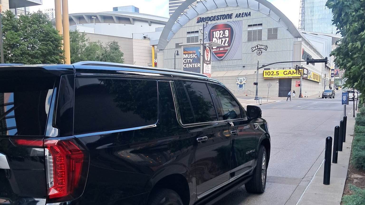 Black SUV near Bridgestone Arena in downtown Nashville